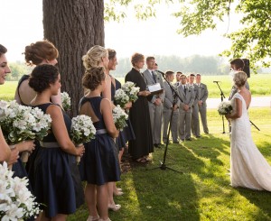 Valerie and Justin say their vows beneath the black walnut tree on Saxon Homestead Farm.