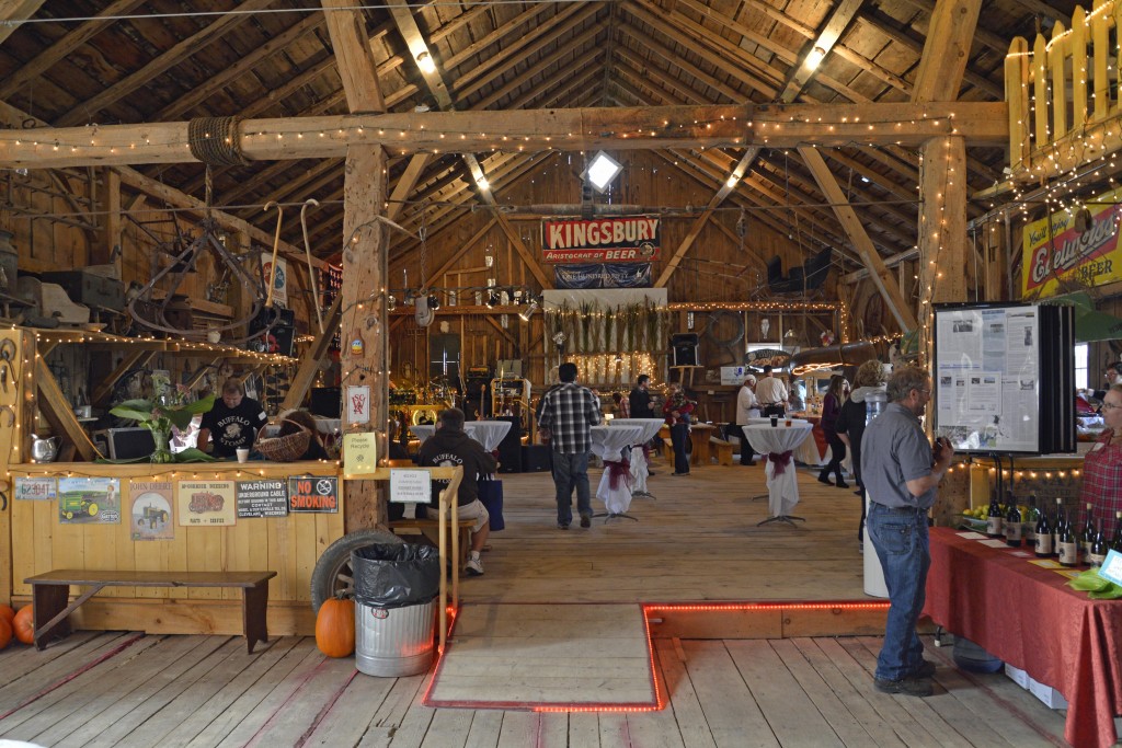 Guests stroll around the decorated barn at our annual barn dance.