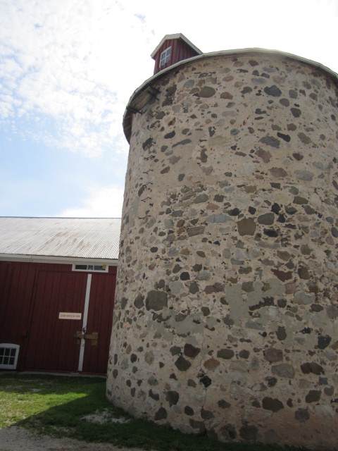A nineteenth-century silo still watches over the farm.